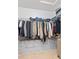 Walk-in closet with clothing racks, storage, and custom organization units for an easy storage solution at 5839 Beacon Cove Way, Indianapolis, IN 46237