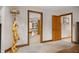 An open doorway with golden statue, light-colored carpet, and beautiful trim offers an inviting view at 6520 Forrest Commons Blvd, Indianapolis, IN 46227