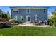 Exterior of home featuring a large backyard with patio, furniture, and fire pit, perfect for entertaining at 664 Hythe Way, Westfield, IN 46074