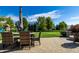 Backyard patio including outdoor dining, putting green, and play set at 664 Hythe Way, Westfield, IN 46074