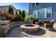 Backyard showing patio area with outdoor seating surrounding a fire pit, perfect for relaxing outdoors at 664 Hythe Way, Westfield, IN 46074