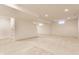Finished basement with neutral carpet and recessed lighting at 664 Hythe Way, Westfield, IN 46074