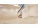 Finished basement showcasing neutral carpet and a staircase leading to the upper level at 664 Hythe Way, Westfield, IN 46074