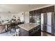 Open concept kitchen with a central island that overlooks dining and living area, great for entertaining at 664 Hythe Way, Westfield, IN 46074