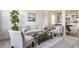 Inviting living room with neutral-toned decor, lots of natural light, and open floor plan at 664 Hythe Way, Westfield, IN 46074
