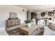 Spacious living area with neutral colors, comfortable seating, and seamless flow to the kitchen and dining spaces at 664 Hythe Way, Westfield, IN 46074