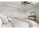 Bright main bedroom featuring neutral decor, tray ceiling, and ceiling fan at 664 Hythe Way, Westfield, IN 46074