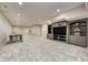 Spacious basement with recessed lighting, neutral carpet and entertainment center at 6778 Old Hunt Club Rd, Zionsville, IN 46077