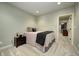 Cozy bedroom featuring neutral carpet, recessed lighting, and a comfortable bed at 6778 Old Hunt Club Rd, Zionsville, IN 46077