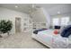 Bright bedroom features a built-in bookshelf and window seat with bright natural light and a ceiling fan at 6778 Old Hunt Club Rd, Zionsville, IN 46077