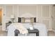 Beautiful bedroom with neutral colors, decorative panels, and cozy furnishings, creating a serene space at 6778 Old Hunt Club Rd, Zionsville, IN 46077