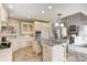 Open concept kitchen with granite countertops, custom cabinets, and stainless steel appliances at 6778 Old Hunt Club Rd, Zionsville, IN 46077