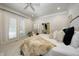 Bright main bedroom boasts neutral tones, ensuite access, and relaxing atmosphere at 6778 Old Hunt Club Rd, Zionsville, IN 46077