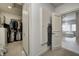 Spacious walk-in closet with extensive storage solutions and natural light at 6778 Old Hunt Club Rd, Zionsville, IN 46077