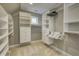 Spacious walk-in closet with custom shelves and drawers, providing ample storage space at 6778 Old Hunt Club Rd, Zionsville, IN 46077