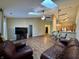 Large living room opens to the kitchen, great for entertaining, and complete with hard wood floors at 7156 Long Shore Cir, Indianapolis, IN 46217