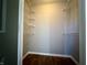 Bright walk-in closet with shelving to maximize storage space at 7156 Long Shore Cir, Indianapolis, IN 46217