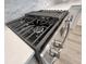 A stainless-steel stove with a cooktop and oven is installed into a kitchen at 737 Madelyn Dr, Carmel, IN 46032