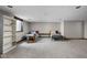 Bright basement area with soft carpet, two small beds, rocking horse, and natural light, great for a ' area at 7619 Bluebird Ct, Brownsburg, IN 46112