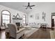 The living room is bright and spacious with a fireplace and vaulted ceiling at 7619 Bluebird Ct, Brownsburg, IN 46112