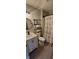 Well-lit bathroom featuring a toilet, sink, and tub shower combo at 7987 Teal Dr, Coatesville, IN 46121