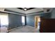 Relaxing primary bedroom suite featuring carpet and natural light from the window at 7987 Teal Dr, Coatesville, IN 46121