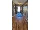 Inviting entryway with hardwood floors and a stylish front door at 7987 Teal Dr, Coatesville, IN 46121