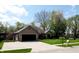 Charming single-story home with an attached garage and well-kept lawn at 7987 Teal Dr, Coatesville, IN 46121