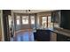 Kitchen eat-in area with stainless steel appliances and bright window views at 7987 Teal Dr, Coatesville, IN 46121