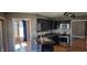Kitchen with stainless steel appliances, black cabinetry, and countertops at 7987 Teal Dr, Coatesville, IN 46121