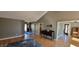 Spacious living room with hardwood floors, neutral walls, and stylish furnishings and fixtures at 7987 Teal Dr, Coatesville, IN 46121