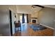 Open-concept living room showcasing a vaulted ceiling and modern fireplace at 7987 Teal Dr, Coatesville, IN 46121