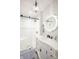 This bathroom has a glass-enclosed shower and a single vanity with an illuminated mirror at 8090 E 550 S, Zionsville, IN 46077