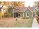 Attractive house exterior with mature trees and colorful fall foliage at 8090 E 550 S, Zionsville, IN 46077