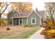 Charming home exterior featuring well-maintained landscaping and vibrant flowers at 8090 E 550 S, Zionsville, IN 46077