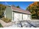 Spacious two-car garage featuring white doors and a side entrance at 8090 E 550 S, Zionsville, IN 46077