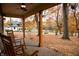 Cozy covered porch featuring wooden rocking chairs and scenic views at 8090 E 550 S, Zionsville, IN 46077