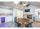 This recreation room has a bar area, fireplace, and a card table in the center at 8090 E 550 S, Zionsville, IN 46077
