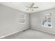 Bedroom with neutral walls, carpet floors, and large windows at 827 N Tacoma Ave, Indianapolis, IN 46201
