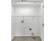 Bright laundry area with wood-look floors, shelving, and all necessary hookups for modern appliances at 827 N Tacoma Ave, Indianapolis, IN 46201