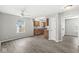Open concept living room, adjacent to the kitchen area, providing plenty of natural light and space at 827 N Tacoma Ave, Indianapolis, IN 46201