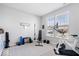 Bright home gym featuring a stationary bike, weight bench, and plenty of space for a great workout at 8861 Linton Ln, Brownsburg, IN 46112