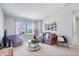 Cozy living room with comfortable seating, view of the lake, and stylish decor at 8861 Linton Ln, Brownsburg, IN 46112