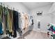 Organized walk-in closet with ample hanging space and shelving for storage at 8861 Linton Ln, Brownsburg, IN 46112