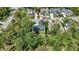 Panoramic aerial shot of a community with diverse homes nestled among mature trees near an active construction site at 907 Oak Terrace Rd, Westfield, IN 46074