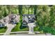 Gorgeous aerial of home near a golf course showcasing lush landscaping, and neighborhood charm at 907 Oak Terrace Rd, Westfield, IN 46074
