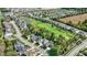 Expansive aerial view of a Primary-planned community, golf course, and lush landscaping at 907 Oak Terrace Rd, Westfield, IN 46074