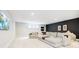 Cozy basement with stylish seating, modern lighting, and ample space for entertainment at 907 Oak Terrace Rd, Westfield, IN 46074
