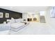 Spacious basement featuring a comfortable seating area and wet bar, perfect for entertaining guests at 907 Oak Terrace Rd, Westfield, IN 46074