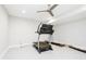 Bright exercise room featuring modern equipment, ceiling fan, and plenty of space at 907 Oak Terrace Rd, Westfield, IN 46074